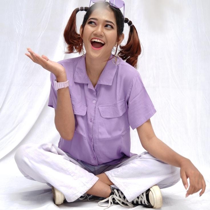 Avery Chen, Lead Design Curator at Atlas Beacon Field, reviewing corporate floral arrangements